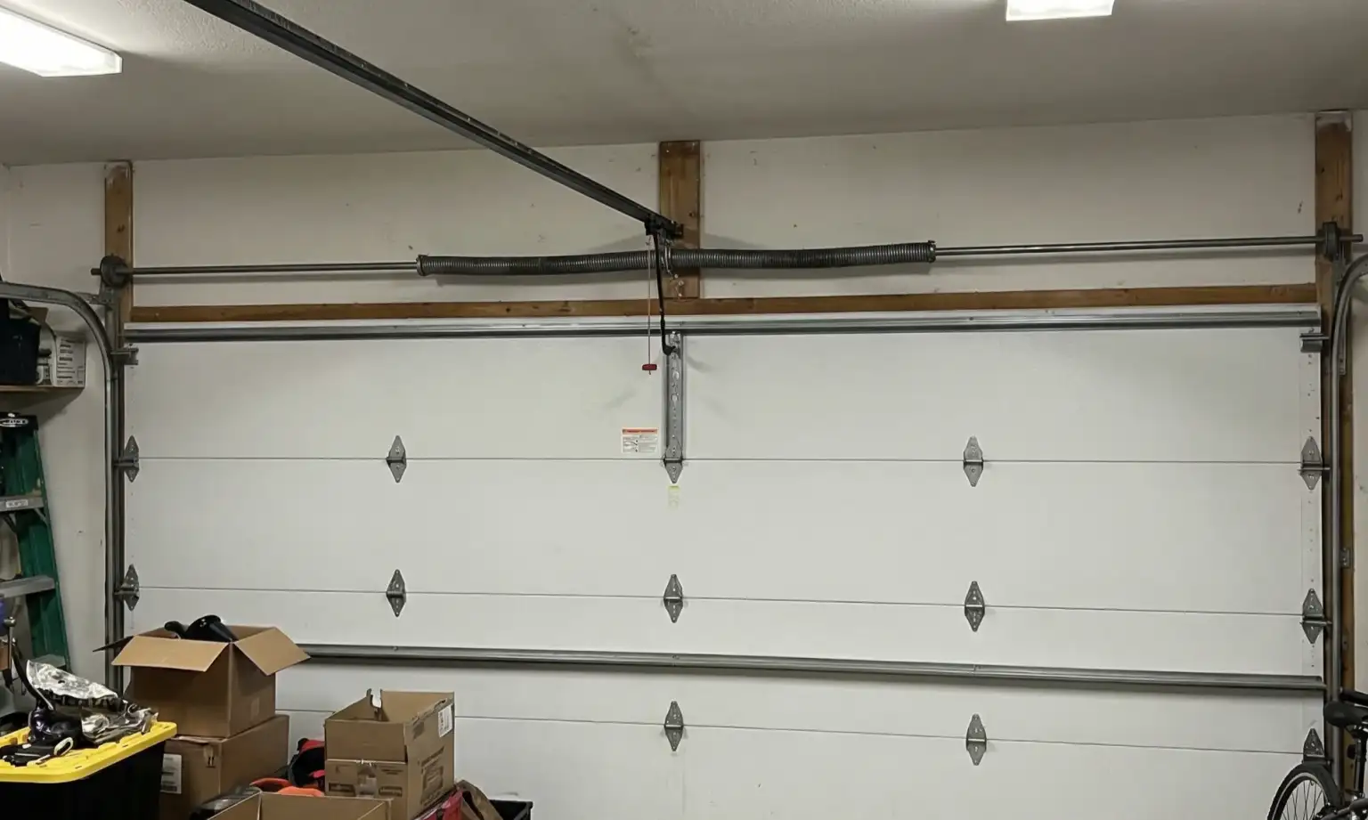 What Causes Garage Door Springs to Break: The Door’s Weight