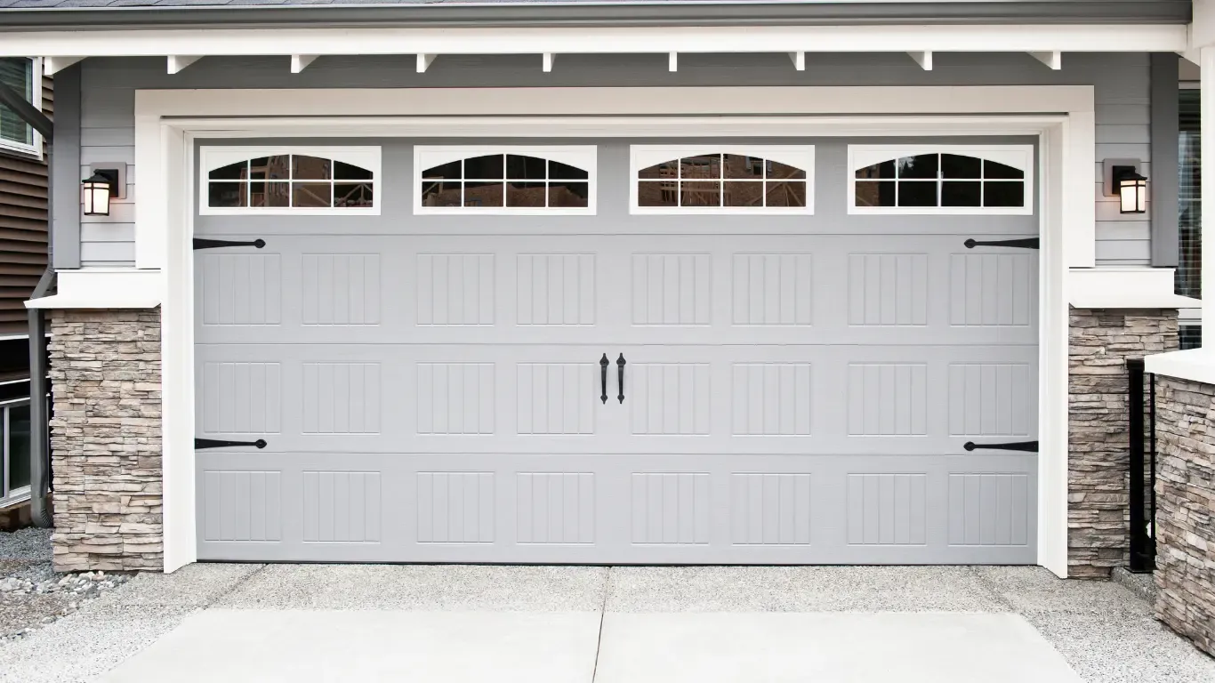 the benefits of installing windows in your garage door photo